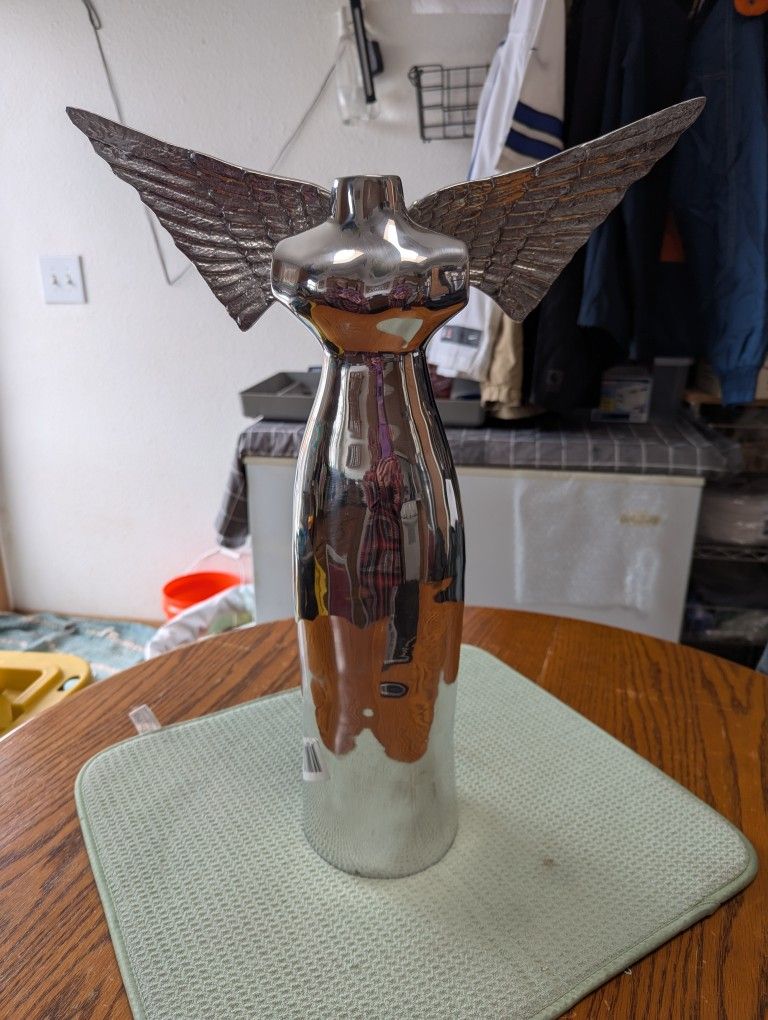 Brutalist winged Angel statue