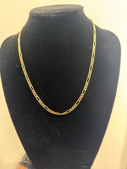 Gold figaro chain