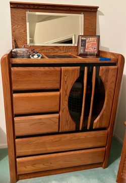 Dresser w/ flip open top with mirror, both sides open for jewelry, tie, belt storage, 5 drawers & shelves behind glass door front 41”wx18d x 49 h