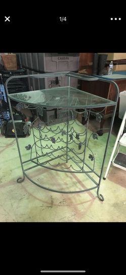 Beautiful wine rack for sale only $60 come get it holds over 30 bottles in a beautiful display