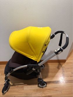 Bugaboo bee yellow stroller in good working condition.