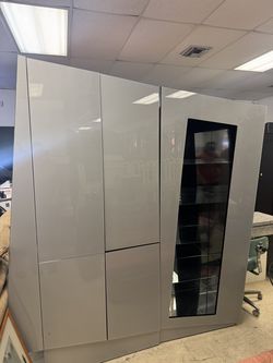 Lisa 2-Door China Cabinet by Status Italy, featuring a white high-gloss lacquer finish and a contemporary design- 82” x 21” x 80”