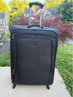 Large, 30” spinner luggage. Great quality and brand, TravelPro. Clean.