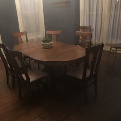 Antique oak clawfoot table and three leaves