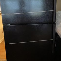 BLACK WHIRLPOOL REFRIGERATOR WITH MATCHING ELECTRIC STOVE
