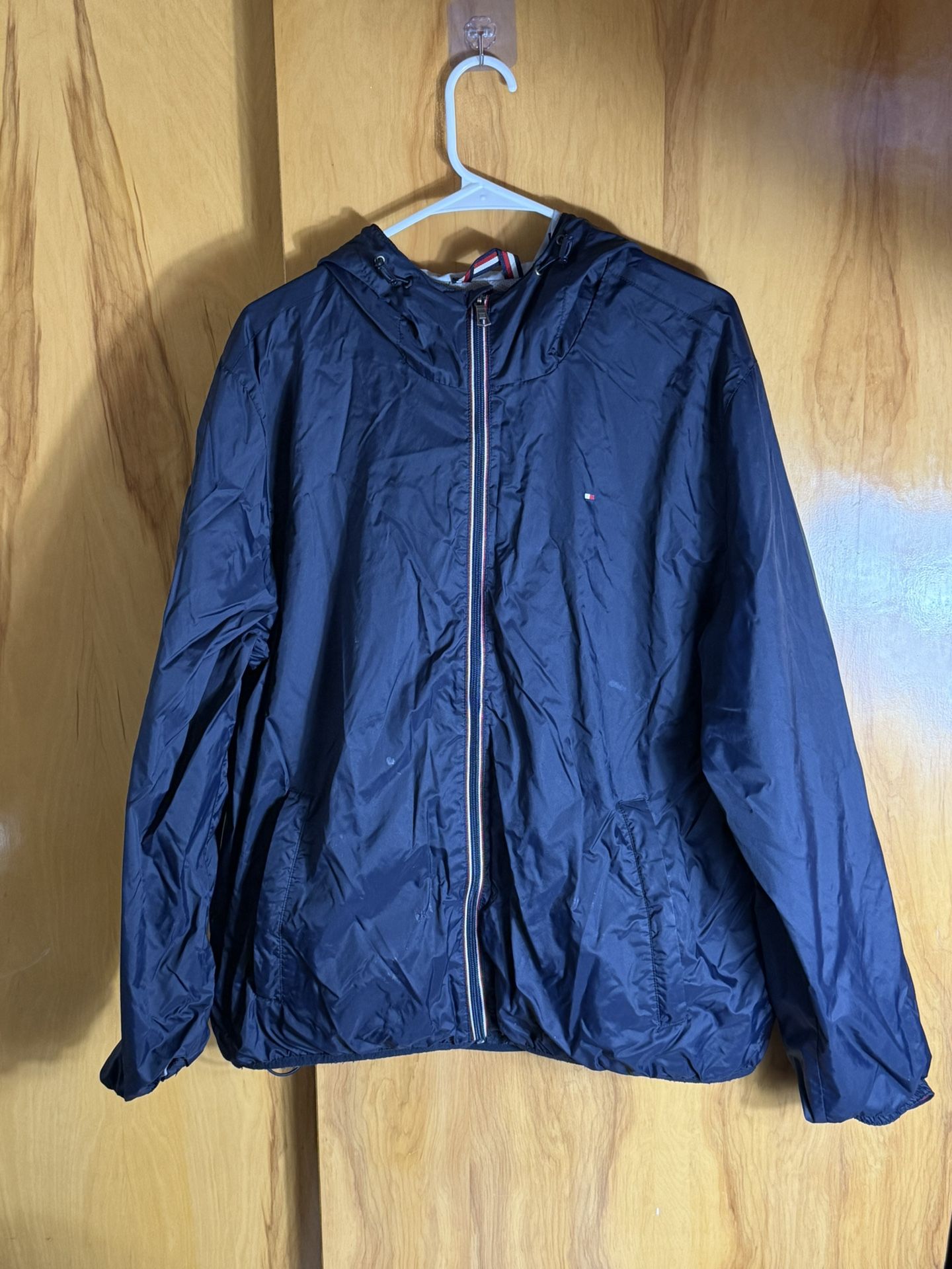 Tommy Hilfiger Men’s Lightweight Hooded Windbreaker Jacket Size XL Flaws as seen in the last picture  Just need to be rewash