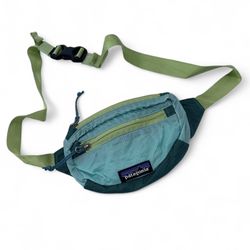 Patagonia Travel Mini Hip Pack Fanny Bag 1L Teal Mint Padded Ripstop Lightweight   This Patagonia Travel Mini Hip Pack Fanny Bag in mint green , lime,