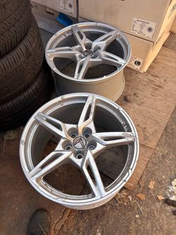 (2) rear corvette wheels like new