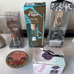 Assorted reed diffusers and candle 