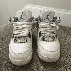 Green and White Jordan 4’s 