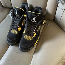Yellow Thunder Jordan 4s 