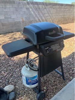 Charbroil two burner grill with heavy duty cover and propane tank Charbroil two burner grill with heavy duty cover and propane tank