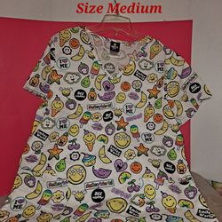 Ladies Printed Smiley World Scrub Top Size M-$10.00