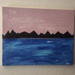 Pink Skies Over The Lake Looking At The Mountains 