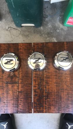 1(contact info removed) Datsun Z center caps