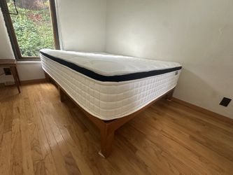 Like new Crysili queen mattress and wood platform bed frame