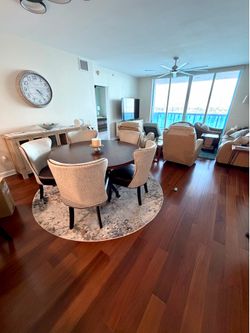 Round Metal Dining Table with 5 Upholstered Chairs