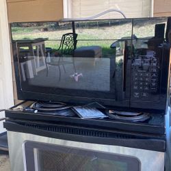 HE Under Cabinet Microwave Clean!