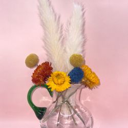 4" art glass hand blown pitcher with an applied handle is a unique and decorative piece