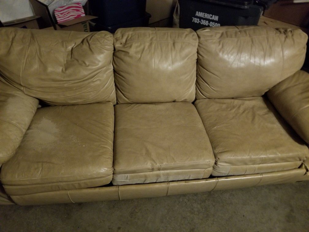 Leather couch with a pull out.