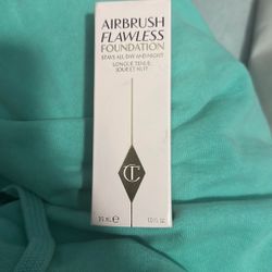 Charlotte Tilbury Airbrush Flawless Foundation, a full-coverage, long-lasting foundation that provides a flawless, airbrushed finish