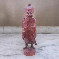 Hand carved, wooden figurine, 6 inches, several scratches on stain,