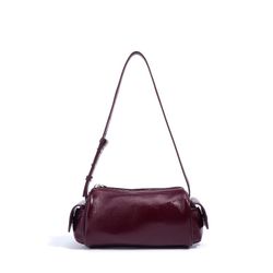 A Luxurious Mini Bag Made of Sheepskin, Designed for Underarm Use, Compact Enough to Hold Pencils, And Perfect for Daily Commutes Or Weekend Outings