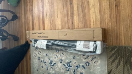 10 ft. Retractable Baby or pet gate new in box 50.00