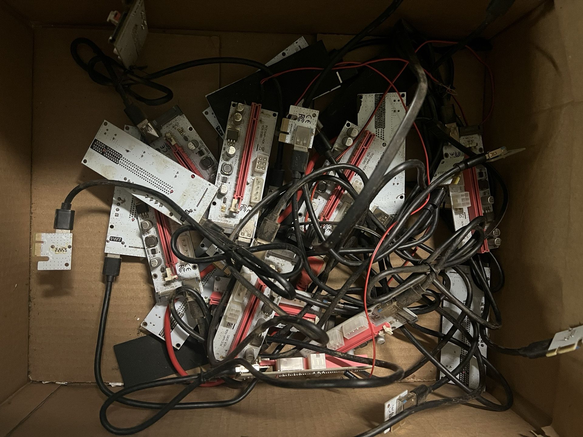 Two Boxes Of PCIe Risers