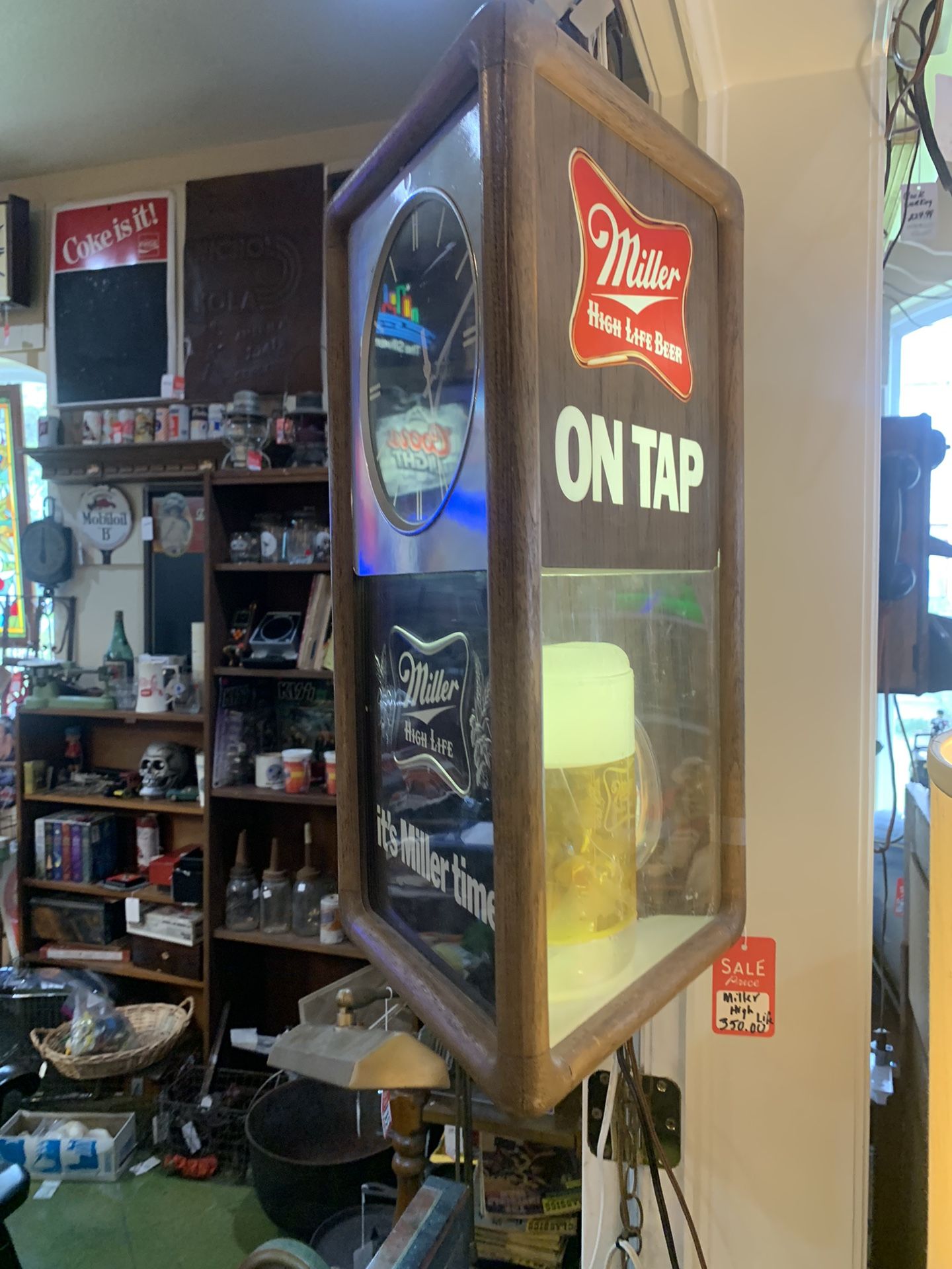 11x21 MILLER HIGH LIFE lighted clock and advertising hanging light Works great! 350.00 Johanna