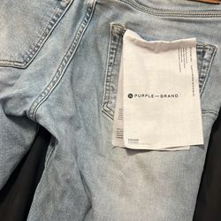 Spider Hoodie And Purple Jeans 