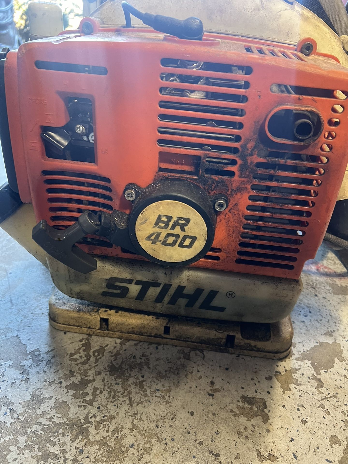 2 leaf blowers Husqvarna and Stihl