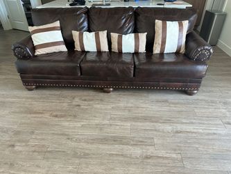 Signature Design by Ashley DuraBlend Antique Brown Sofa Leather couch, smoke and pet free, single female household