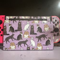 Nintendo Switch + four controllers + games