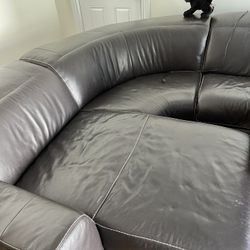 Leather Sectional With Dual Recliners And Pullout Bed 