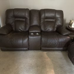 Duel leather power love seat