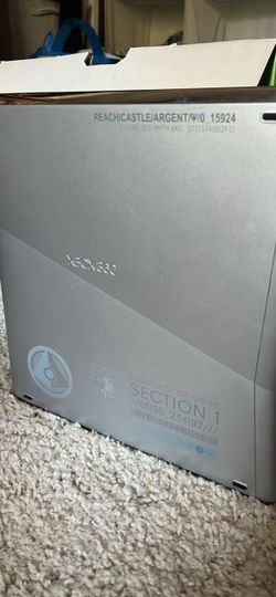 Xbox 360 halo reach console and wireless controllers and a wired controller