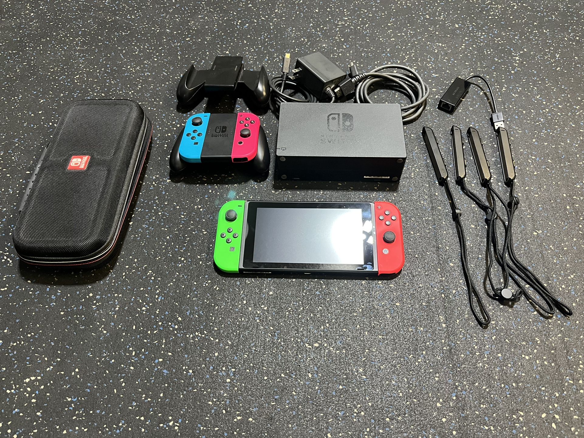 Nintendo Switch + 128 GB Micro SD + Carry Case & 4 Joy Cons