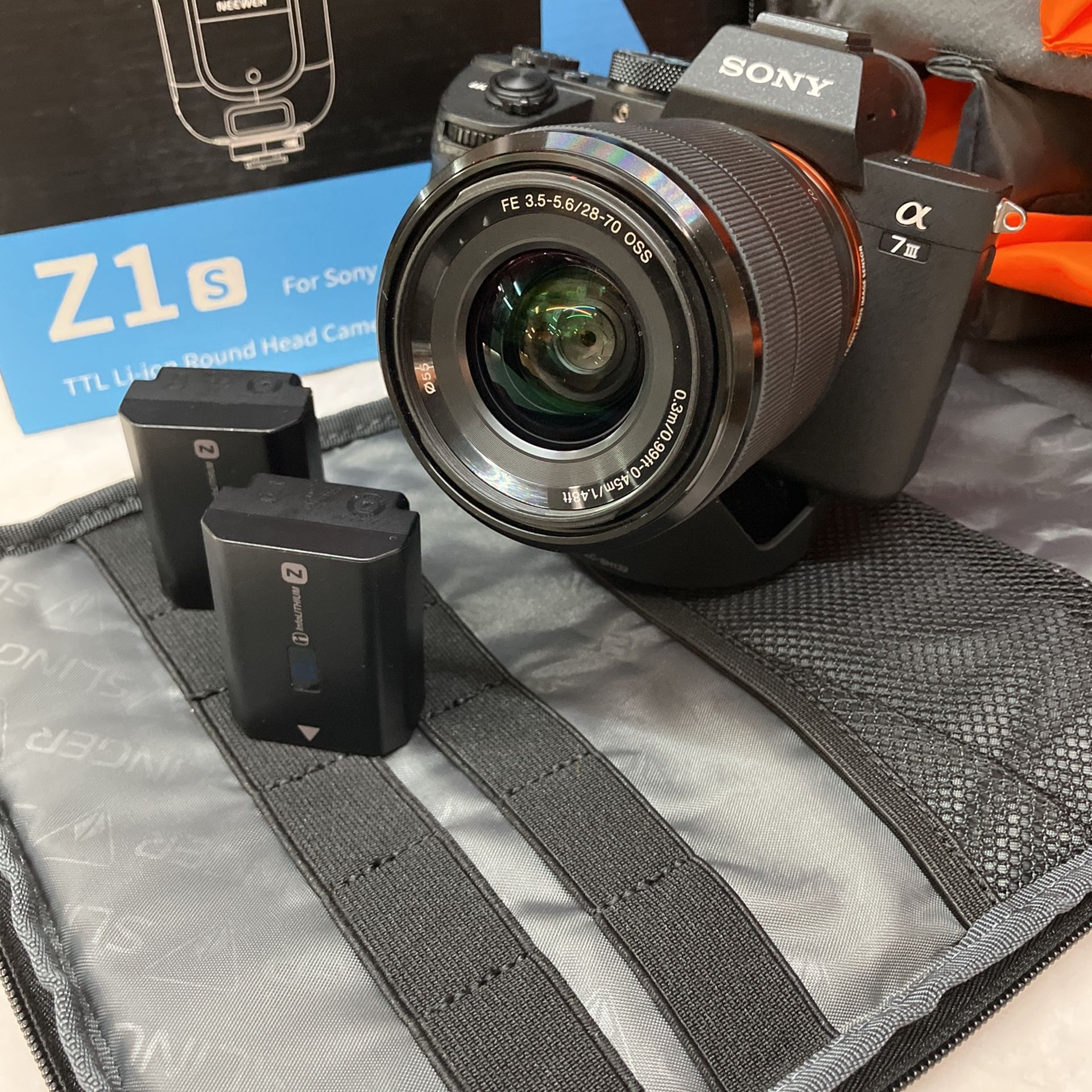 Sony a7III camera, 28-70mm Lens, Two Batteries, Padded Bag And TTL Flash