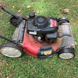 Running & cutting Lawn Mower ( Base Is Almost Rusted Out ). $25.00