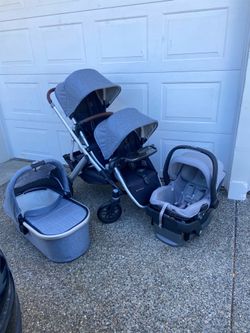 Blue Melange Uppababy V2 Vista Double Stroller with bassinet and car seat