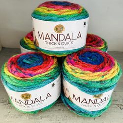 Five rolls of mandala thick and quick lion brand yarn each is 5.3 oz, 87 yards. 100% acrylic Swirl tourbillion color . Unused.   