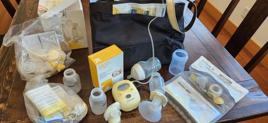 Medela bottles, pump and supplies