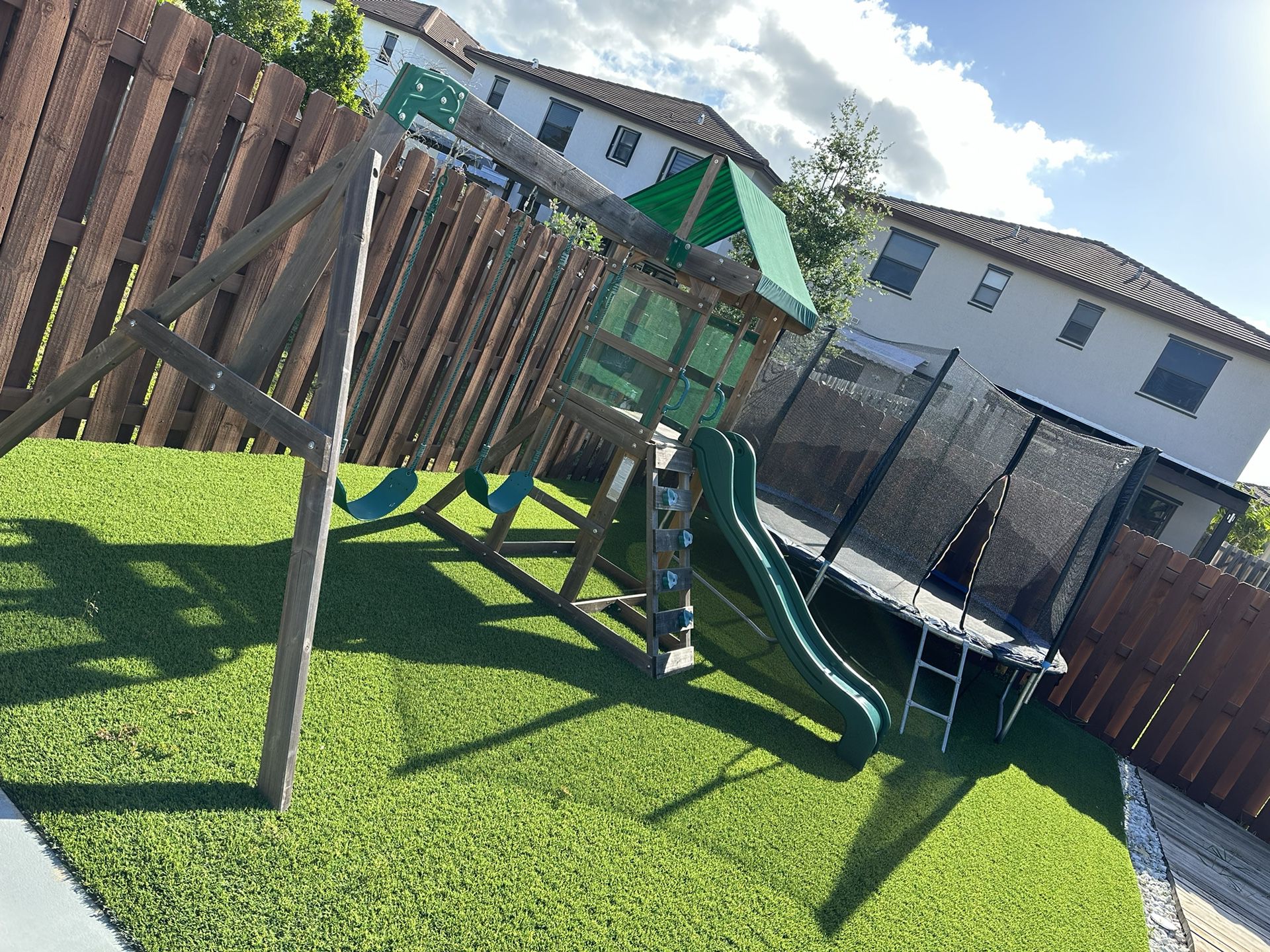 Wood Swing Set and Trampoline 