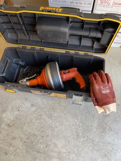 Electric Drain Cleaner Snake in DeWalt Toolbox