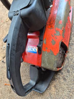 Homlite 240 chain saw and a troy built push mower