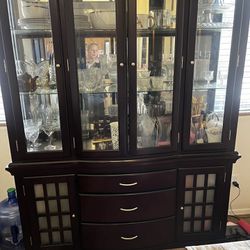 Hutch with glass shelving and lighting. 