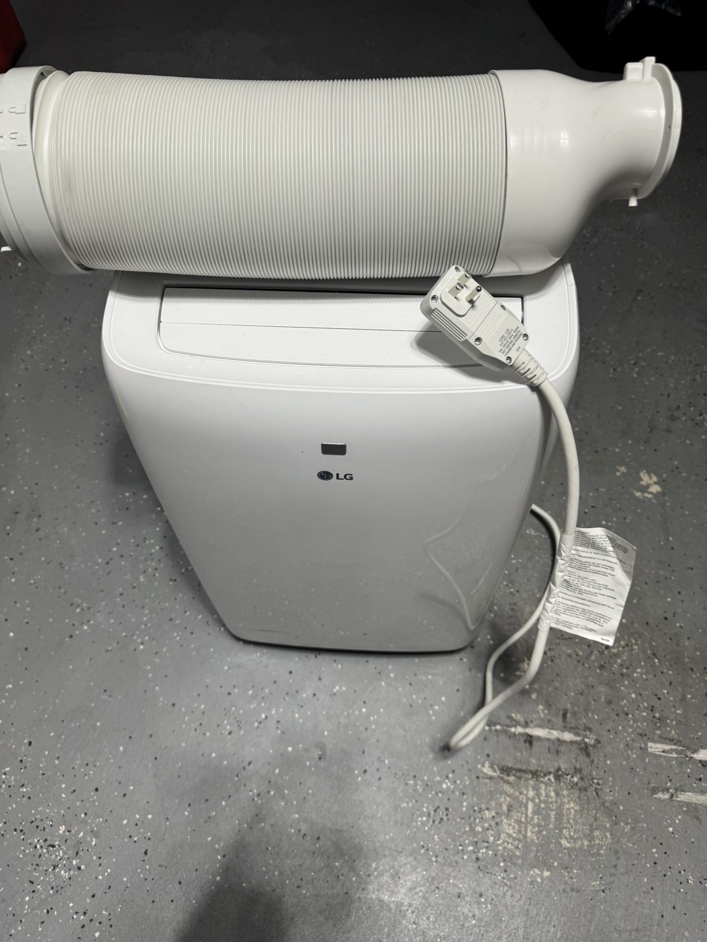 LG 7,000 (DOE) BTU 115-Volt Portable Air Conditioner Cools 300 Sq. Ft. with Dehumidifier and LCD Remote in White
