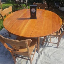 Wooden table for sale comes with 4 chairs