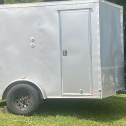 6x8 enclosed Beam trailer and With bull nose front 